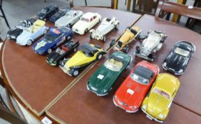 SIXTEEN APPROXIMATELY 1:18 SCALE DIE CAST MODELS OF CLASSIC CARS, makers include Polistil, Morgan