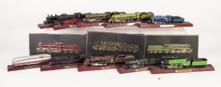 NINE MOULDED PLASTIC STATIC MODELS OF STEAM LOCOMOTIVES WITH TENDERS displayed on section of track