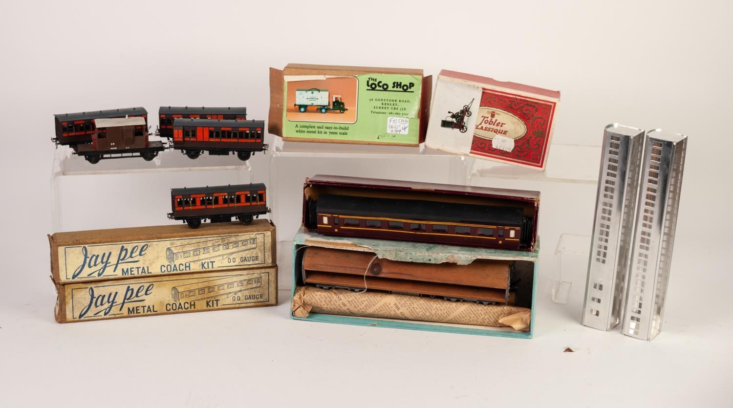 RAKE OF FOUR MADE UP 'OO' GAUGE METAL KITS OF VINTAGE FOUR WHEEL PASSENGER COACHES, brown and orange