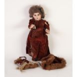 EARLY 20th CENTURY BISQUE SWIVEL HEADED DOLL with pierced ears, open mouth showing teeth and