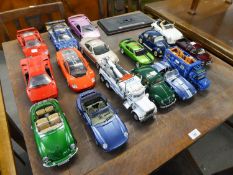 SIXTEEN APPROXIMATELY 1:18 SCALE DIE CAST MODELS OF MODERN SPORTS AND OTHER VEHICLES, includes Motor