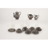 DOLL'S HOUSE ANTIMONY TEA SERVICE FOR SIX, 15 pieces, plus a circular salver, all cast with an