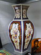 A LARGE ORIENTAL PORCELAIN HEXAGONAL VASE, PAINTED WITH EXOTIC BIRDS, 41cm high