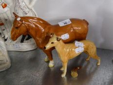 A LARGE BESWICK POTTERY MODEL OF LIGHT BROWN HEAVY HORSE (ONE EAR MISSING AND ONE LEG BROKEN OFF;