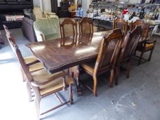 A CONTINENTAL WALNUT DINING ROOM SUITE OF 9 PIECES, TO INCLUDE; EXTENDING DINING TABLE WITH TWO