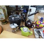 GREEN GLAZED AND CHROME LID 'FOR LIFE' TEAPOT, TWO OTHERS AND A LARGE BLACK CAULDRON (4)