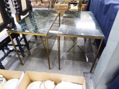 A PAIR OF BRASS FRAMED OBLONG COFFEE TABLES, EACH WITH INSET BLACK AND VEINED MARBLE TOP, FOUR