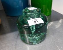 AN ANTIQUE GREEN GLASS LARGE AND HEAVY CIRCULAR INKWELL AND COVER