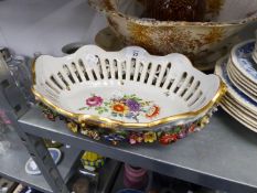 MODERN GERMAN FLORAL ENCRUSTED AND PIERCED PORCELAIN OVAL BASKET, with hand painted floral centre,