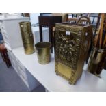 AN EMBOSSED BRASS RECTANGULAR STICK STAND, A CIRCULAR STICK STAND AND A SMALL WASTE BIN