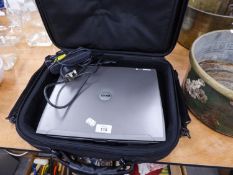 DELL LAPTOP COMPUTER WITH CHARGING ADAPTER IN A DELL CARRYING CASE