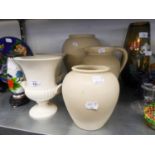 A PAIR OF WEDGWOOD WHITE POTTERY URN SHAPED VASES AND THREE ITEMS OF LOVATTS WHITE POTTERY, VIZ