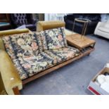 1970's TEAK TWO SEATER SETTEE, WITH FOUR LOOSE CUSHIONS AND REMOVABLE END COFFEE TABLE, 6'3" LONG,