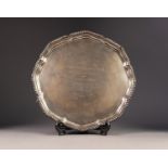 PRESENTATION SILVER SALVER BY EDWARD VINERS, with gadrooned border to the wavy outline, raised on