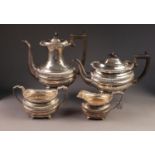 EDWARD VII FOUR PIECE SILVER TEA AND COFFEE SET BY NATHAN & HUGHES, of rounded oblong form with