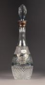 CUT GLASS SKITTLE SHAPED DECANTER AND STOPPER WITH SILVER COLLAR, flash cut with a central floral