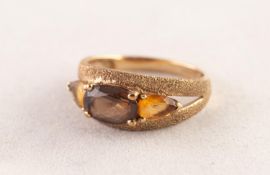 9ct GOLD TEXTURED DRESS RING, with centre oval amethyst, flanked by two tear shaped citrines