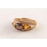 9ct GOLD TEXTURED DRESS RING, with centre oval amethyst, flanked by two tear shaped citrines