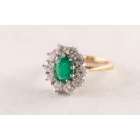 18ct GOLD, EMERALD AND DIAMOND OVAL CLUSTER RING, set with centre oval emerald approximately 10mm