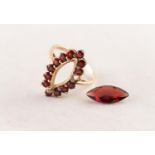 9ct GOLD MARQUISE SHAPED RING with centre marquise shaped garnet and surround of thirteen small,