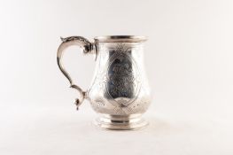 VICTORIAN SILVER PRESENTATION TANKARD, of footed, baluster form with leaf capped double scroll