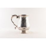 VICTORIAN SILVER PRESENTATION TANKARD, of footed, baluster form with leaf capped double scroll