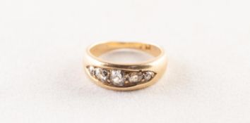 VICTORIAN GOLD RING WITH A LOZENGE SHAPED SETTING OF FIVE OLD CUT DIAMONDS, graduated from the