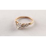 18ct GOLD AND PLATINUM RING CLAW SET WITH A ROUND, OLD CUT SOLITAIRE DIAMOND, approximately 0.