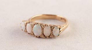 9ct GOLD RING SET WITH FIVE OVAL OPALS graduating from the centre, 4.4gms, ring size P/Q