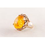 9ct GOLD AND CABOCHON OVAL AMBER RING over a chain pattern surround, 4.2 gms, ring size O/P