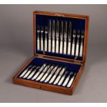 OAK CASE CONTAINING A SET OF 12 FRUIT KNIVES AND 12 FRUIT FORKS with engraved silver plated