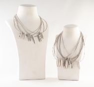 FIFTEEN VERY SIMILAR MODERN ITALIAN SILVER TWISTED WIRE NECKLACES, each suspending elliptical and