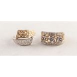 9ct GOLD RING, the open work top having three floral clusters of tiny blue stones, the flanking