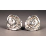 PAIR OF EDWARDIAN SILVER BROOCHES, each embossed with an Art Nouveau female head with scrolling