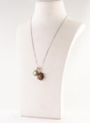 9ct GOLD, TIGER'S EYE AND GARNET OVAL PENDANT set with a cabochon tiger's eye and surround of twelve