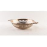 GEORGE VI SILVER QUAICH SHAPED TWO HANDLED BON BON DISH, with pierced border and handles, Birmingham