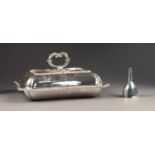 ELECTROPLATED ENTRÉE DISH AND COVER of waisted oblong form with inverted corners, gadrooned