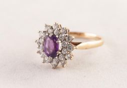 9ct GOLD, AMETHYST AND CUBIC ZIRCONIA CLUSTER RING, set with an oval amethyst and two tier