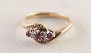 9ct GOLD CROSS-OVER RING set with ten tiny diamonds and three small rubies, 2.9 gms, ring size M/N