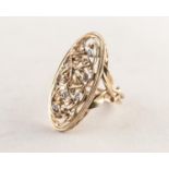 9ct YELLOW AND WHITE GOLD RING, the large oval openwork top formed of foliate scrolls with white