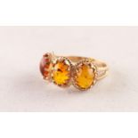 9ct GOLD RING with three cabochon oval golden amber, each in a multi claw setting, 3.8 gms, ring