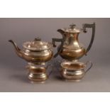 GEORGE VI SILVER FOUR PIECE TEA SET BY EDWARD VINERS, of bellied, rounded oblong form with black