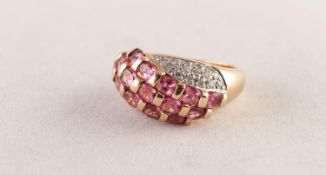 14ct GOLD, RUBY AND TINY DIAMOND SET COCKTRAIL RING, the domed top set with three diagonal bands