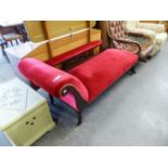 AN EDWARDIAN RED VELVET COVERED CHAISE LONGUE