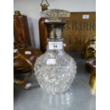 A HEAVY CUT GLASS BULBOUS WINE DECANTER WITH SILVER NECK AND GLASS MUSHROOM STOPPER, LONDON HALLMARK