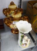 A CONTINENTAL CHINA VASE, ENCRUSTED WITH FLOWERS AND WITH BOY AND DOG AT BASE (AS FOUND) AND A