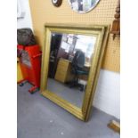LARGE GILT DECORATED FRAMED BEVELLED EDGE WALL MIRROR