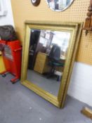 LARGE GILT DECORATED FRAMED BEVELLED EDGE WALL MIRROR