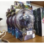 FOUR BOXED 'THE GOLDEN COMPASS' FIGURES  (4)