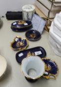SEVEN PIECES OF LIMOGES, FRANCE PORCELAIN, EACH DECORATED IN GILT ON DARK BLUE WITH A LADY AND